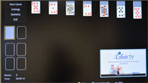 TV Screenshot of Solitaire game with Picture in Picture. 